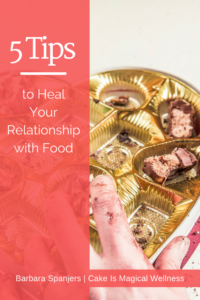 Hand smeared with chocolate, reaching into an almost-empty heart-shaped candy box. Text overlay, "5 Tips to Heal Your Relationship with Food"