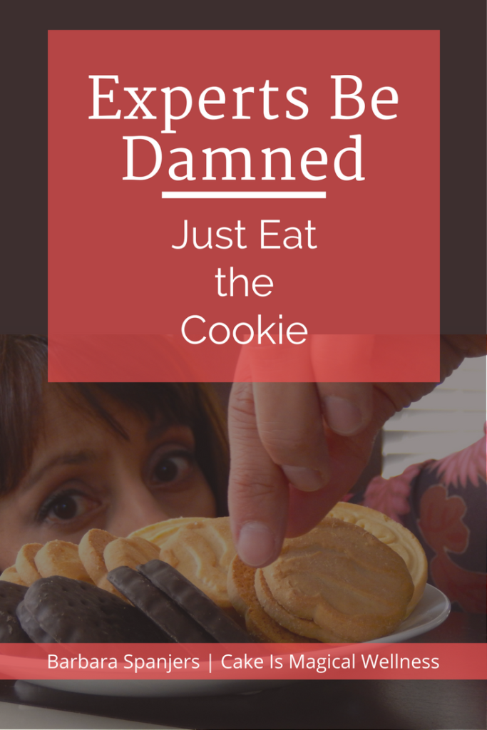 woman sneaking cookie off plate with text overlay that says "Experts Be Damned: Just Eat the Cookie"